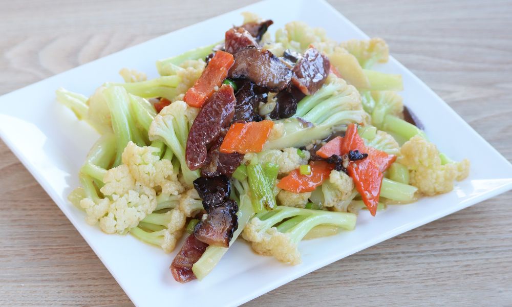 Cauliflower stir-fried with waxed meat at Hong Kong City Restaurant, a Chinese Restaurant in Alameda