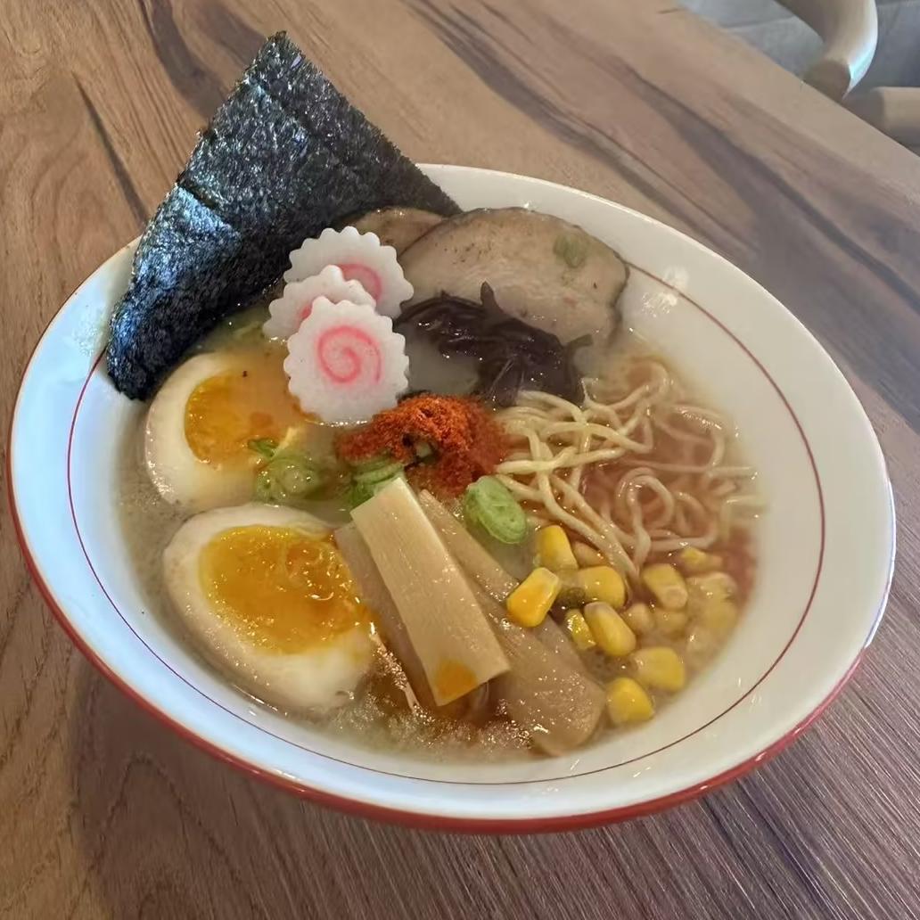 Hokkaido-Ramen-Japanese-restaurant-Tan-Tan-Ramen-Kill-Devil-Hills Tan Tan Ramen - Spicy ramen with eggs, charsiu, and chili flakes at Hokkaido Ramen, a Japanese restaurant in Kill Devil Hills