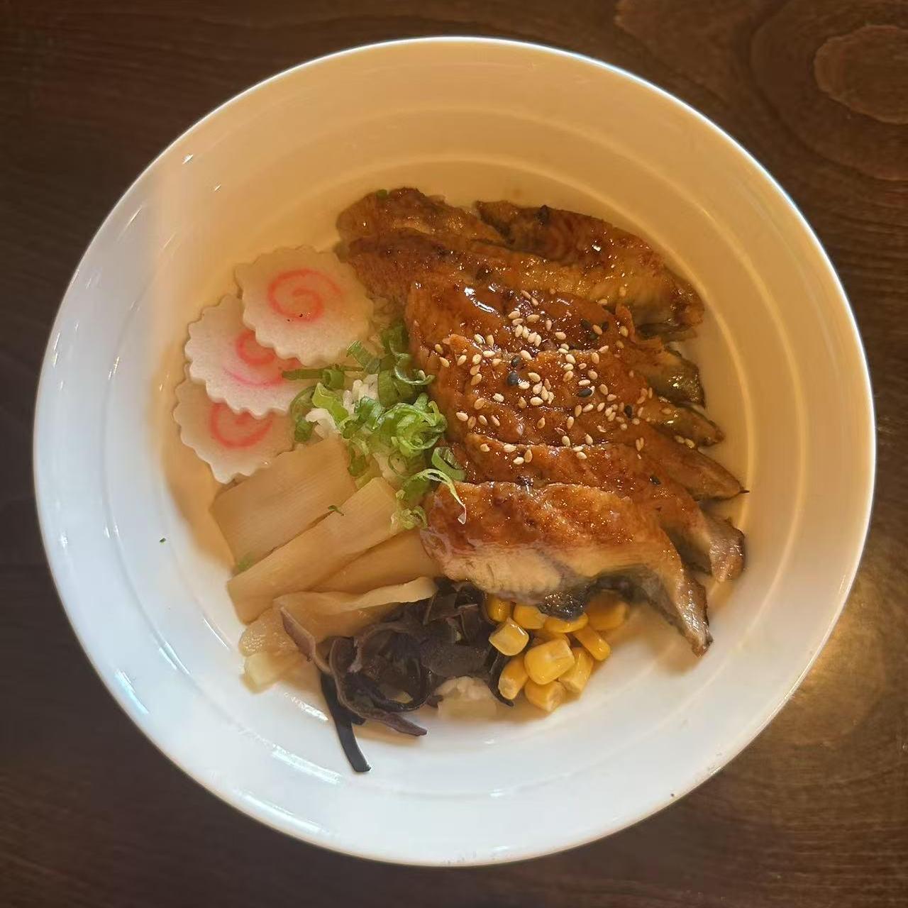 Hokkaido-Ramen-Japanese-restaurant-Unagi-Don-Kill-Devil-Hills Unagi Don - Rice bowl with grilled eel, veggies, and corn at Hokkaido Ramen, a Japanese restaurant in Kill Devil Hills