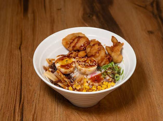 Rice bowl with teriyaki chicken, egg and corn at Hokkaido Ramen, a Japanese restaurant in Kill Devil Hills