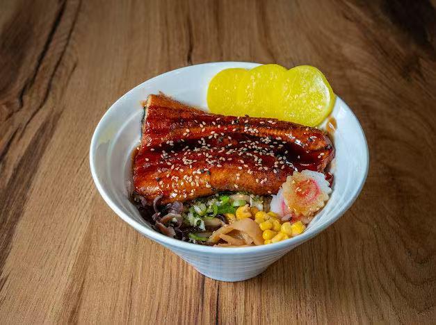 Unagi donburi with eel, corn and pickles at Hokkaido Ramen, a Japanese restaurant in Kill Devil Hills