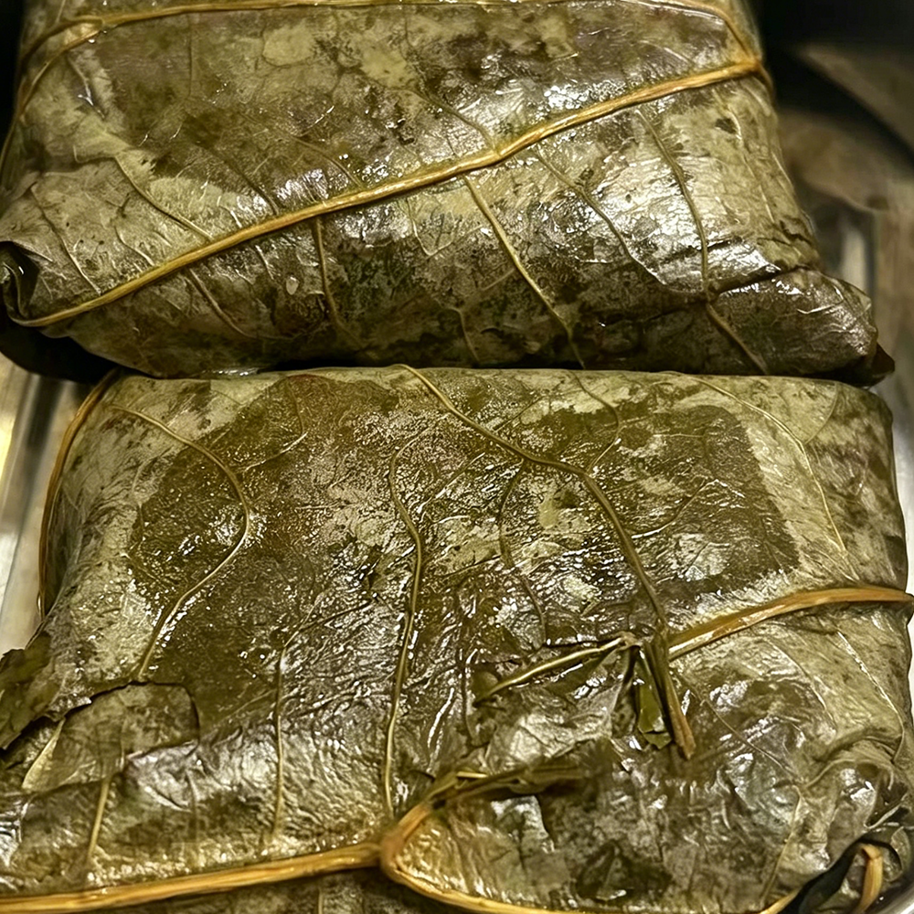 Steamed sticky rice wrapped in fragrant lotus leaves at Hongda Dough House, a Chinese Restaurant in North Plains
