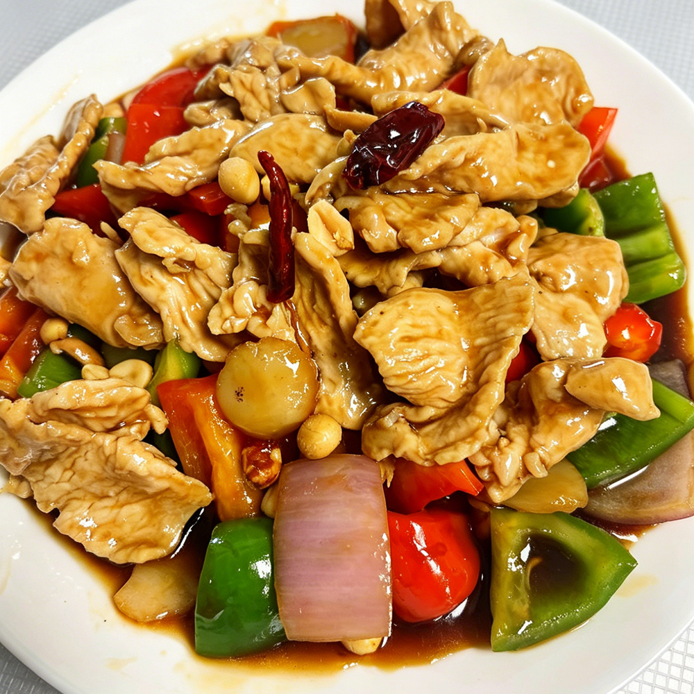 Sliced chicken stir-fried with colorful peppers and nuts at Hongda Dough House, a Chinese Restaurant in North Plains