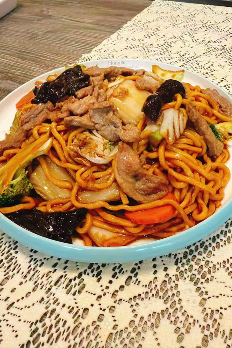 Stir - fried Noodles with tender beef & veggies, savory and filling at Hong Jie Special Noodles & Dumplings，a Chinese Restaurant in Hurst