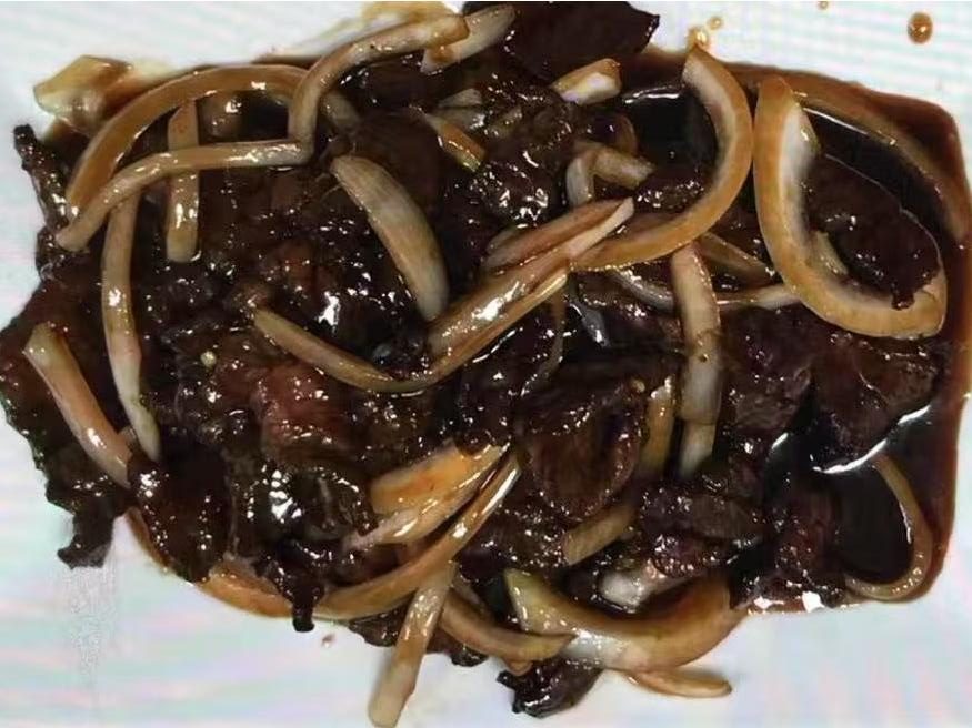Beef with Onion Stir Fry - Beef stir - fried with onions in a savory sauce at Hong Kong Chinese Cuisine, a Chinese Restaurant in Twin Falls