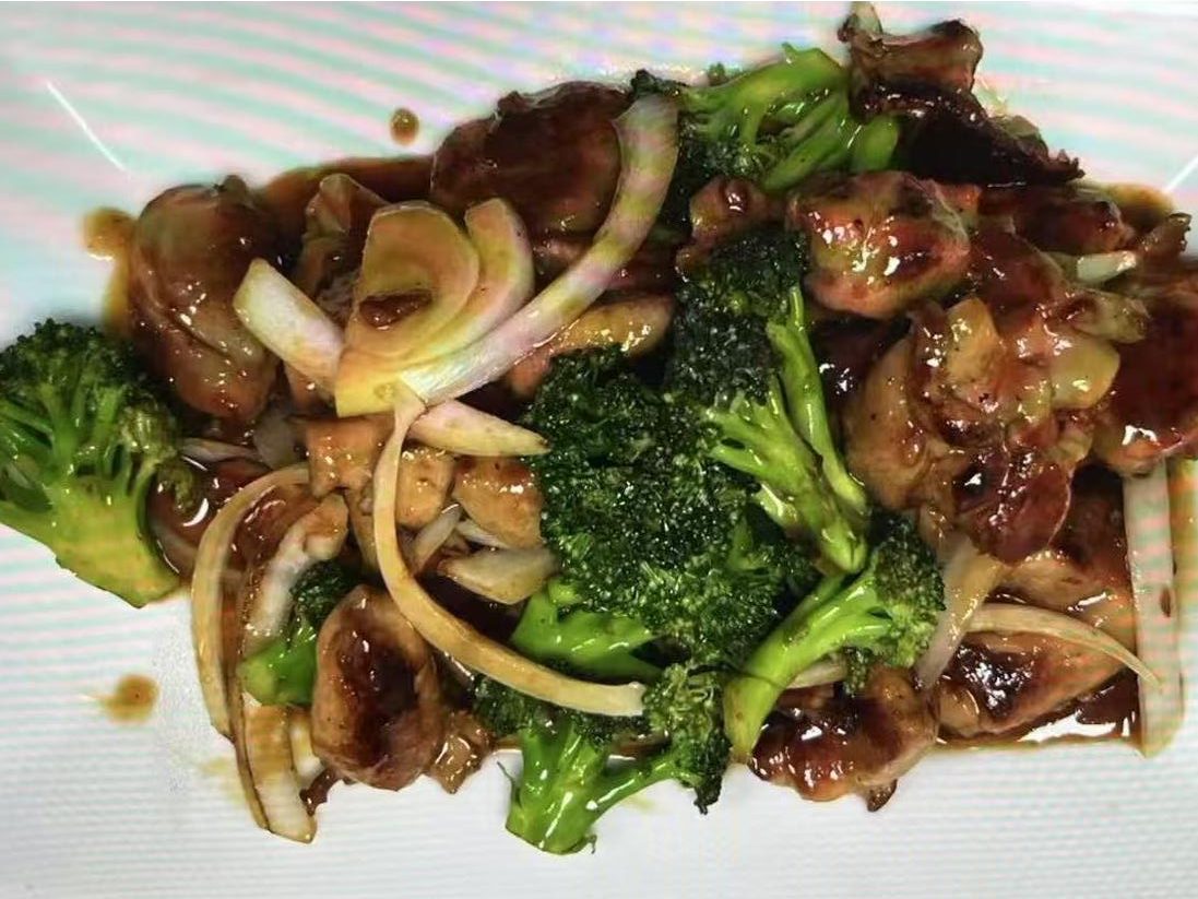 Chicken with Broccoli and Onion - Chicken pieces stir - fried with broccoli and onions at Hong Kong Chinese Cuisine, a Chinese Restaurant in Twin Falls