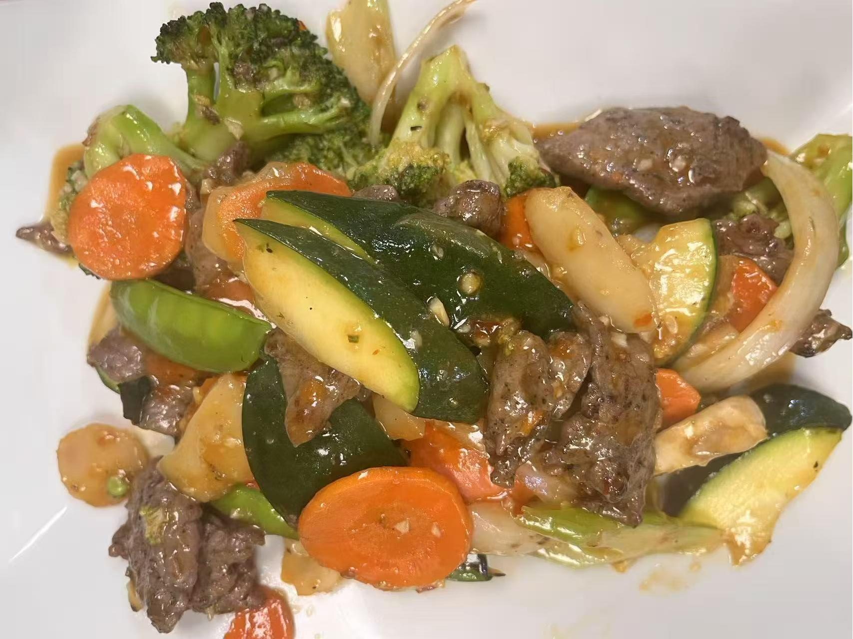 Beef with Vegetables Mixed Fry - Stir - fried beef with broccoli, carrots and zucchini at Hong Kong Chinese Cuisine, a Chinese Restaurant in Twin Falls
