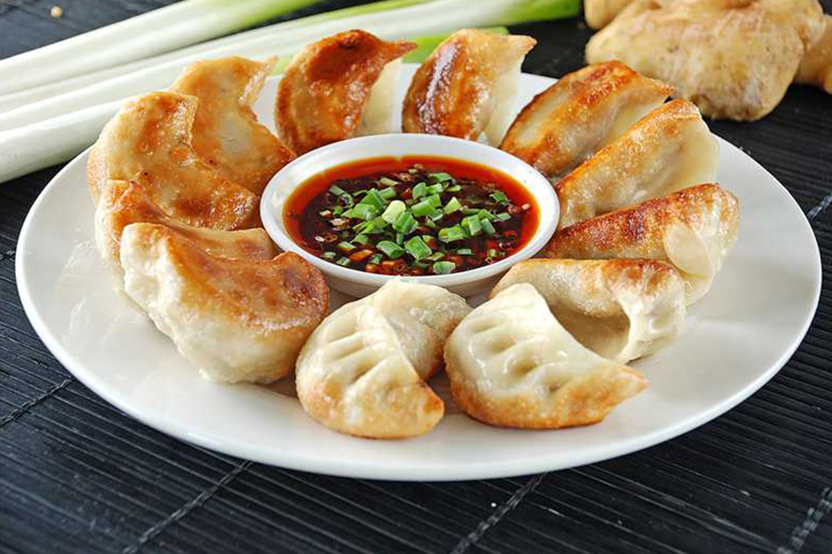 Crispy pan - fried dumplings with savory filling at Hot Dumpling, a Chinese restaurant in Lake Forest