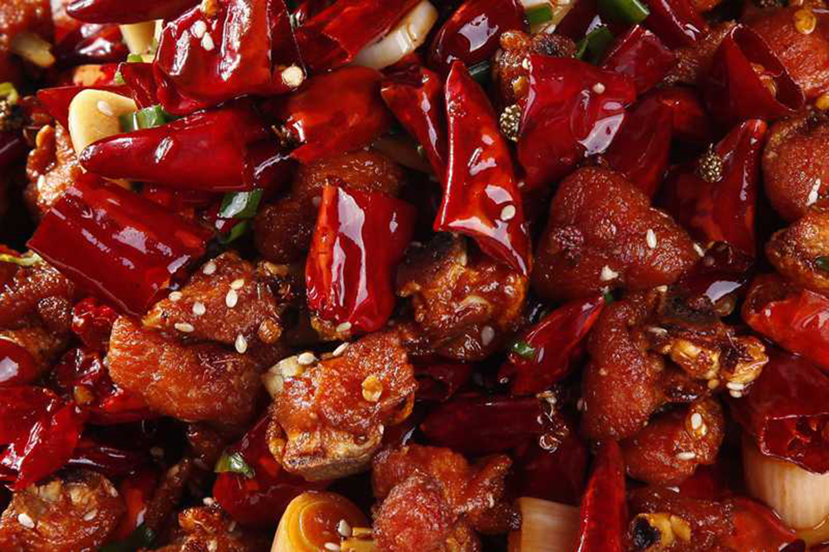 Chongqing spicy chicken with crispy chicken pieces and plenty of dried red chilies at Hot Dumpling, a Chinese restaurant in Lake Forest