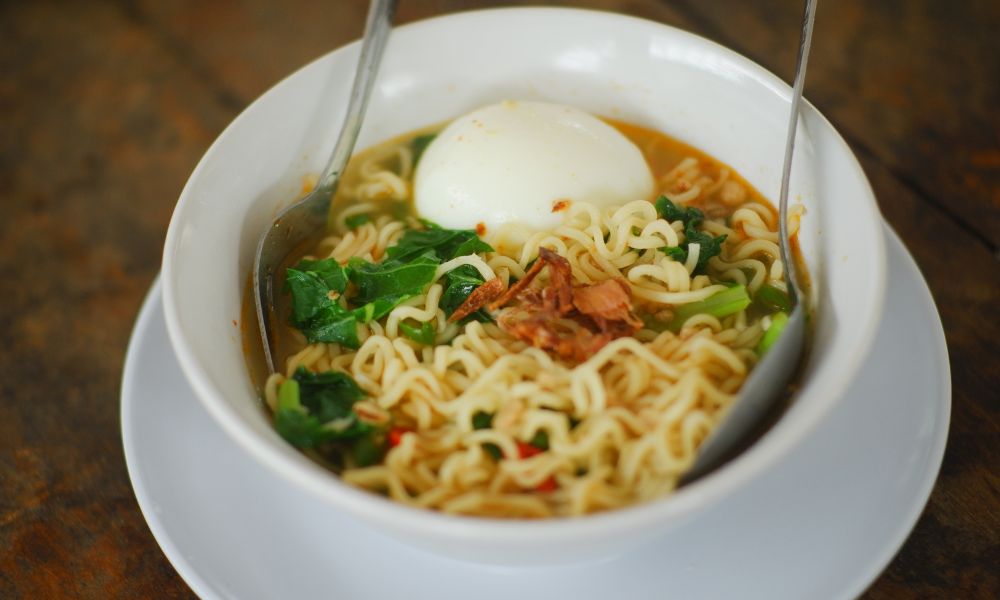 Instant noodle soup with egg, greens, and meat toppings at Hot Point The Dalles, a Chinese restaurant in The Dalles