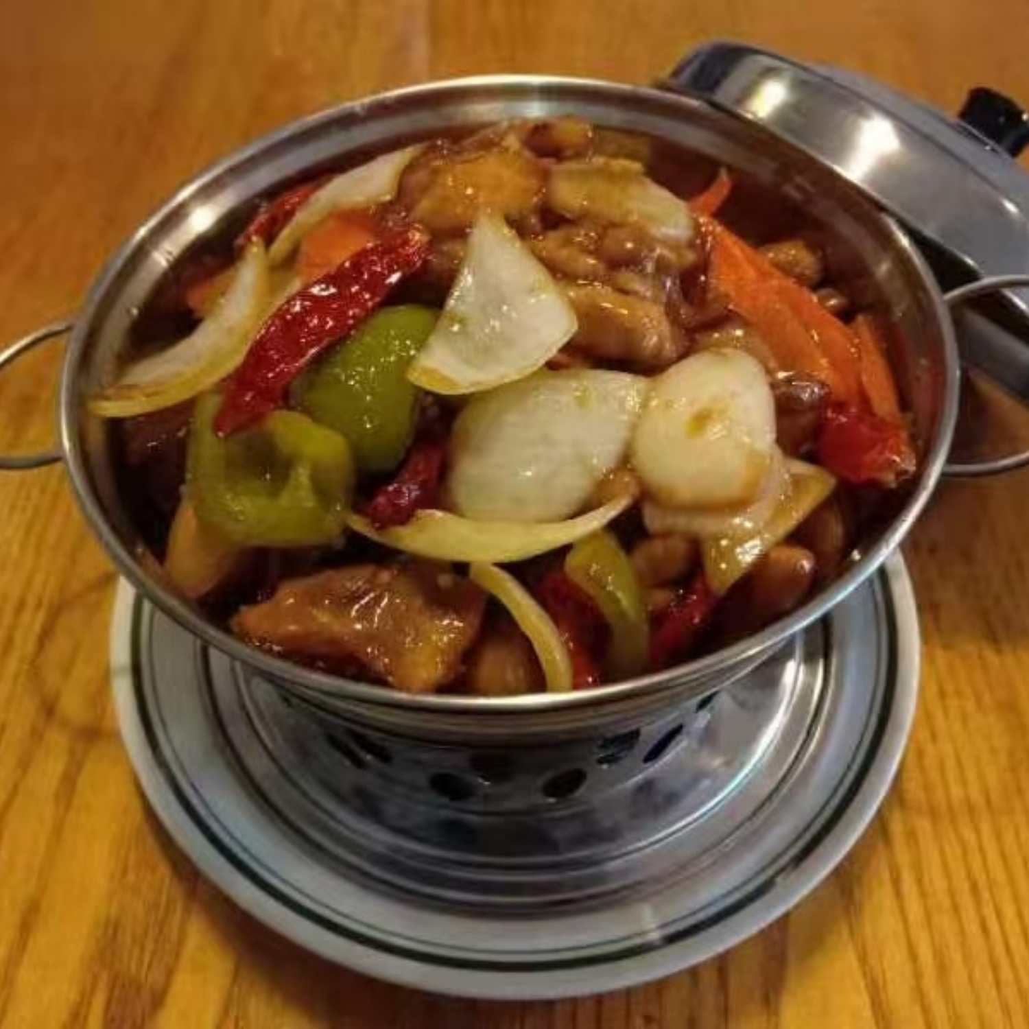 Hot pot braised chicken with bell pepper and onion