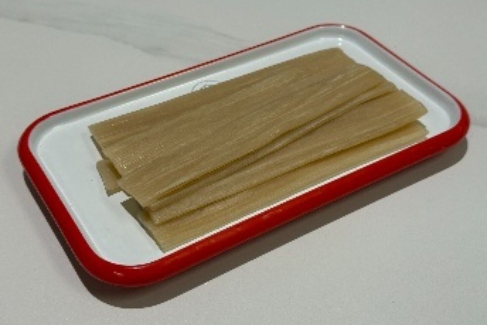 Wide rice noodles hot pot ingredient at Hotpot Bay, a Chinese Hot Pot Restaurant in San Francisco