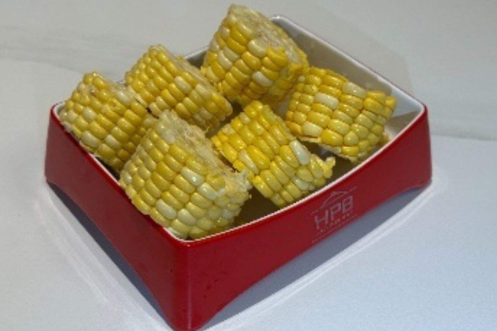 Fresh corn cobs hot pot ingredient at Hotpot Bay, a Chinese Hot Pot Restaurant in San Francisco