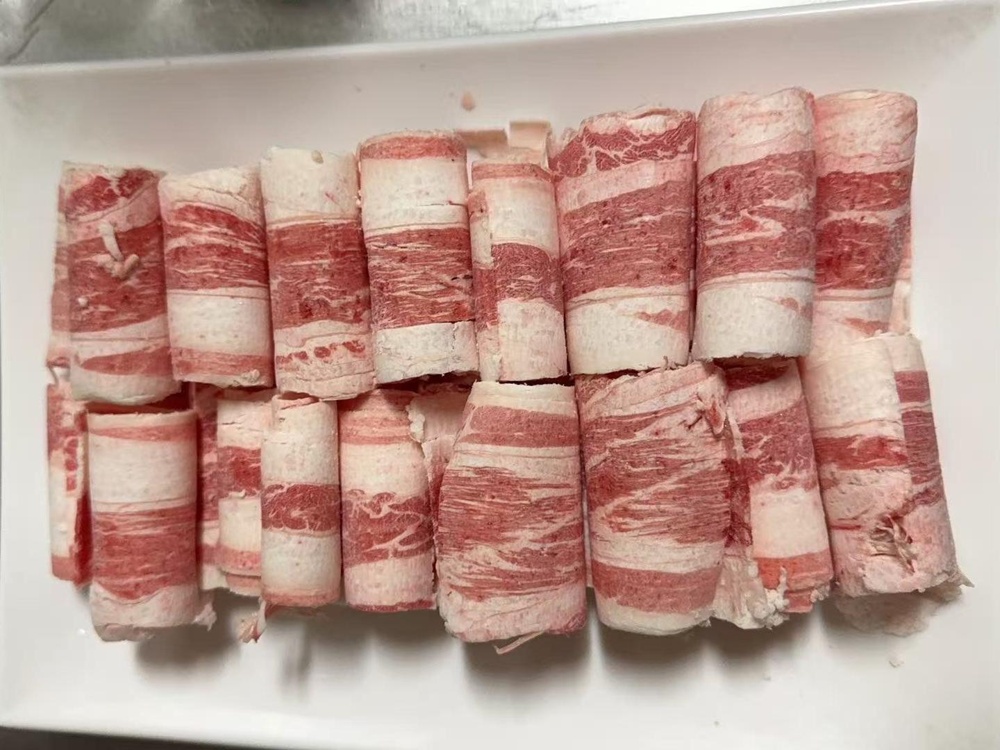 Hot-Pot-Delight-Hot-Pot-Restaurant-Thick-Sliced-Beef-Roll-Hot-Pot-Ingredient-Roselle Thick Sliced Beef Roll Hot Pot Ingredient - Thick - cut beef rolls for a hearty hot pot experience at Hot Pot Delight, a Hot Pot Restaurant in Roselle