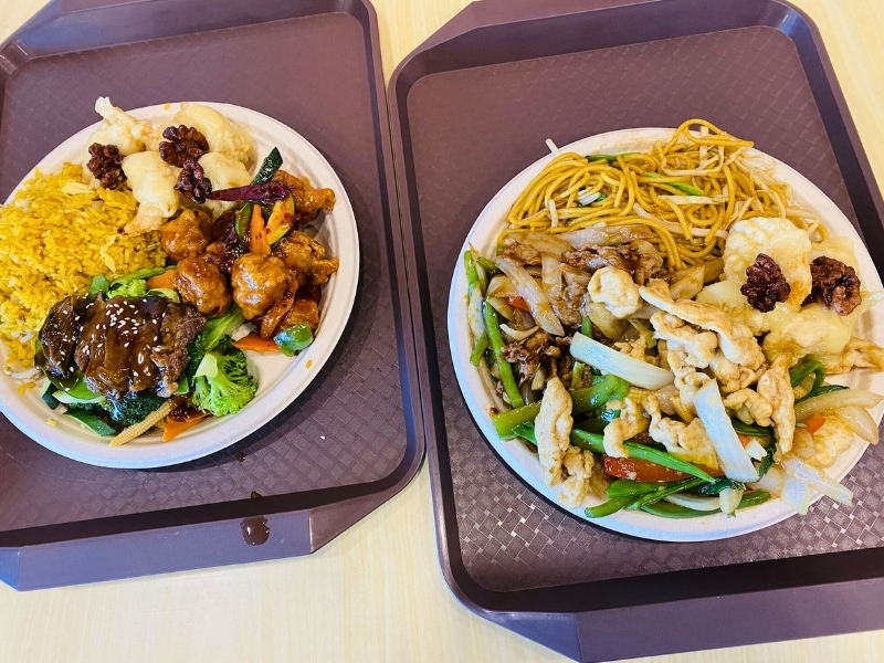 Mixed meal platters with rice, noodles and entrees at Hoya Asian Express, a Chinese Restaurant in Watertown