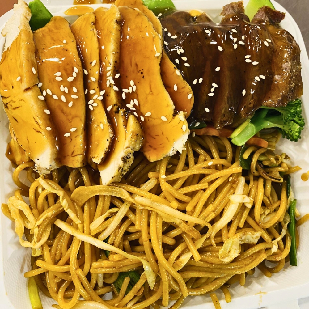 Sesame chicken & beef with noodles and broccoli at Hoya Asian Express, a Chinese Restaurant in Watertown