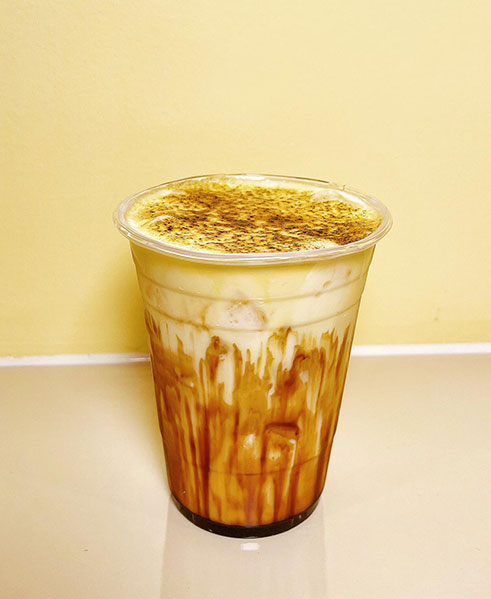 Brown sugar latte with foam and caramel drizzle at TOZZARELLA, a Dessert restaurant in College Point