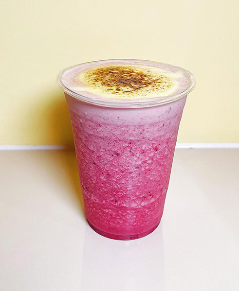 Pink berry smoothie with torched foam top at TOZZARELLA, a Dessert restaurant in College Point