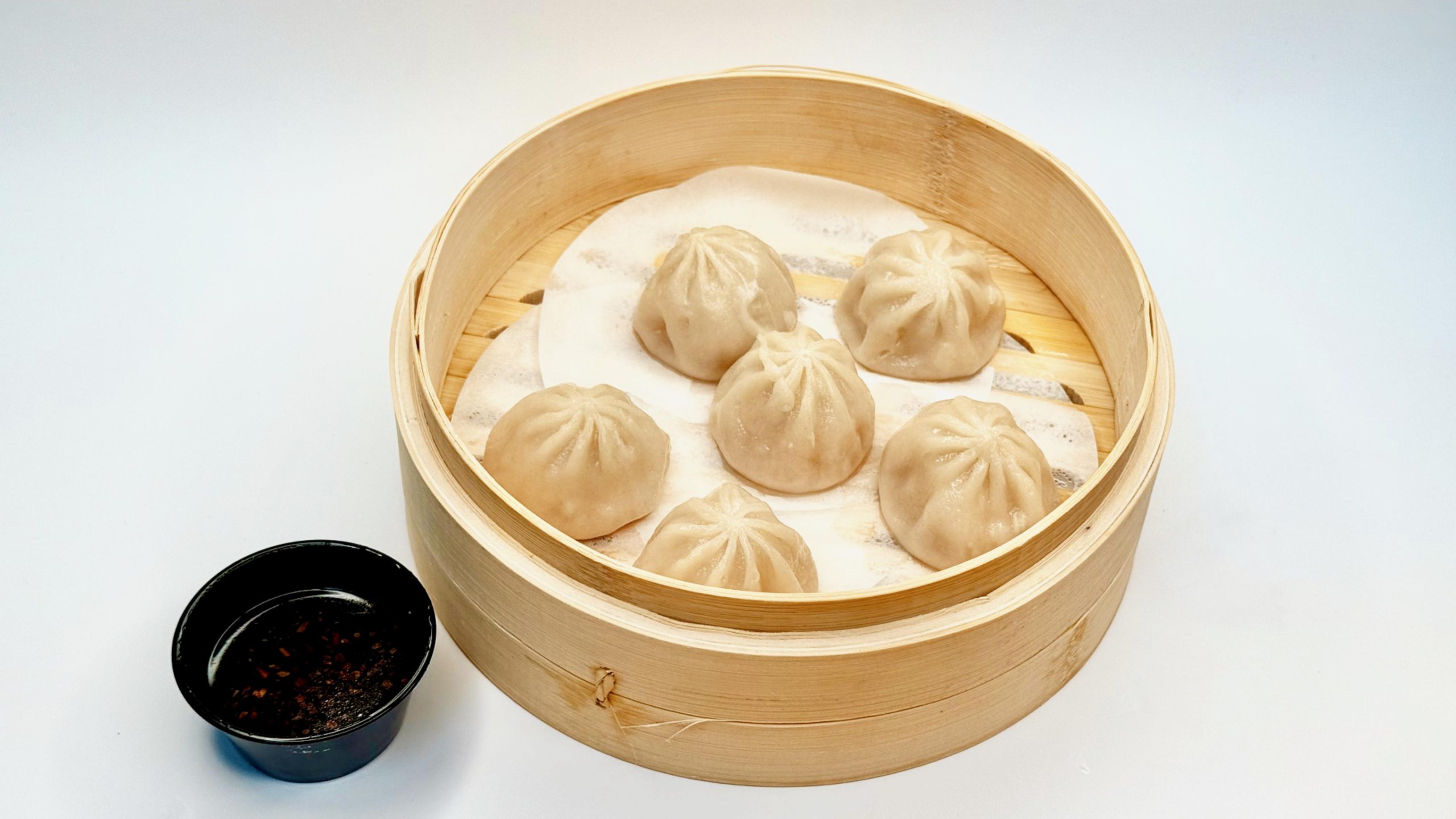 HTEA-CAFE-Café-Restaurant-Steamed-Dumplings-With-Chili-Oil-Dip-Troy Steamed Dumplings With Chili Oil Dip from HTEA CAFE, a Café Restaurant in Troy