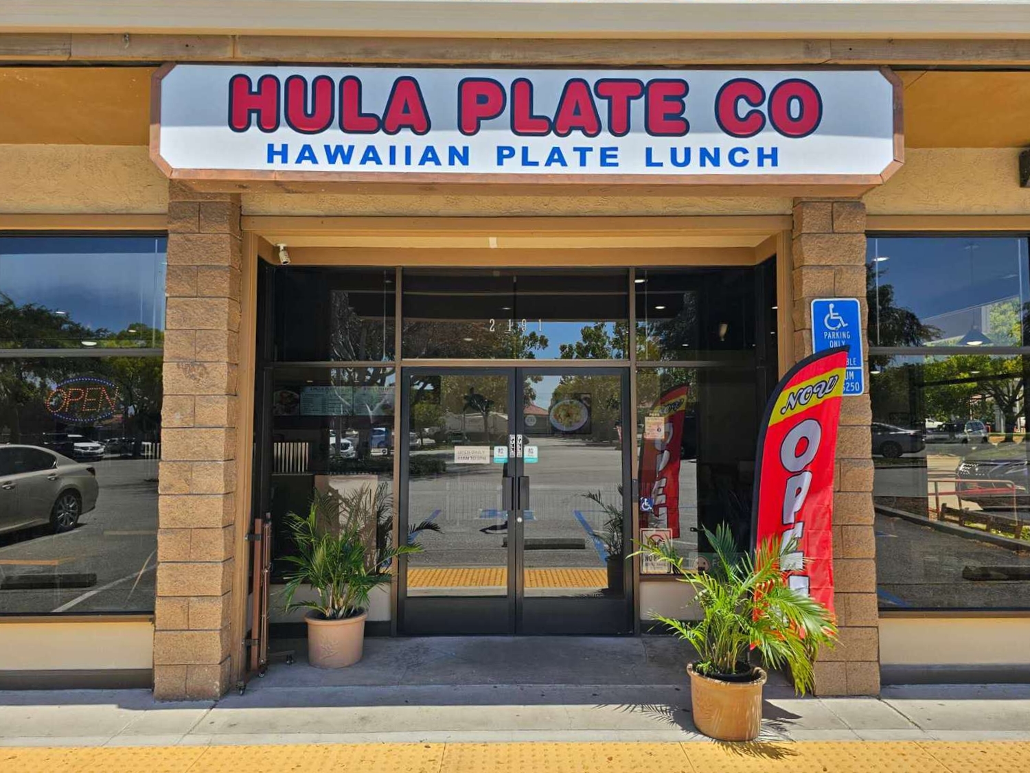 Storefront entrance of Hula Plate Co Hawaiian eatery at Hula Plate Co, a Hawaiian Restaurant in San Jose
