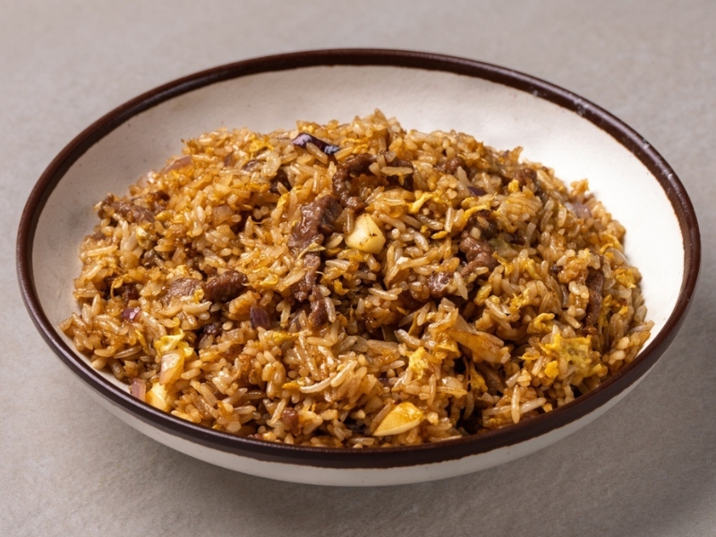 Beef fried rice with eggs, onions and garlic at Hunan Tapas, an Hunan Restaurant in NY
