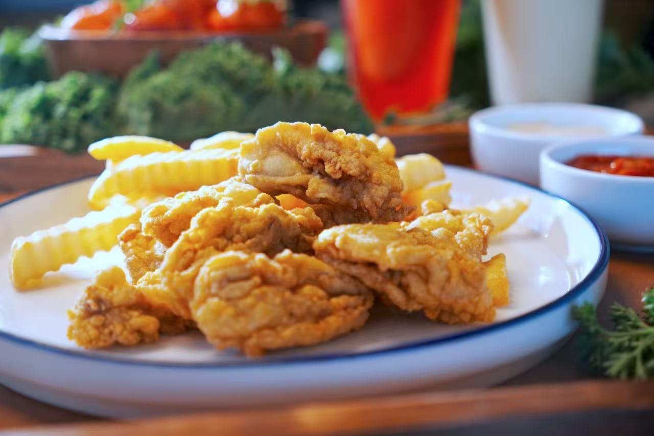 Fried Calamari with Fries at Hutto Seafood Wings Seafood Restaurant in Irmo, South Carolina