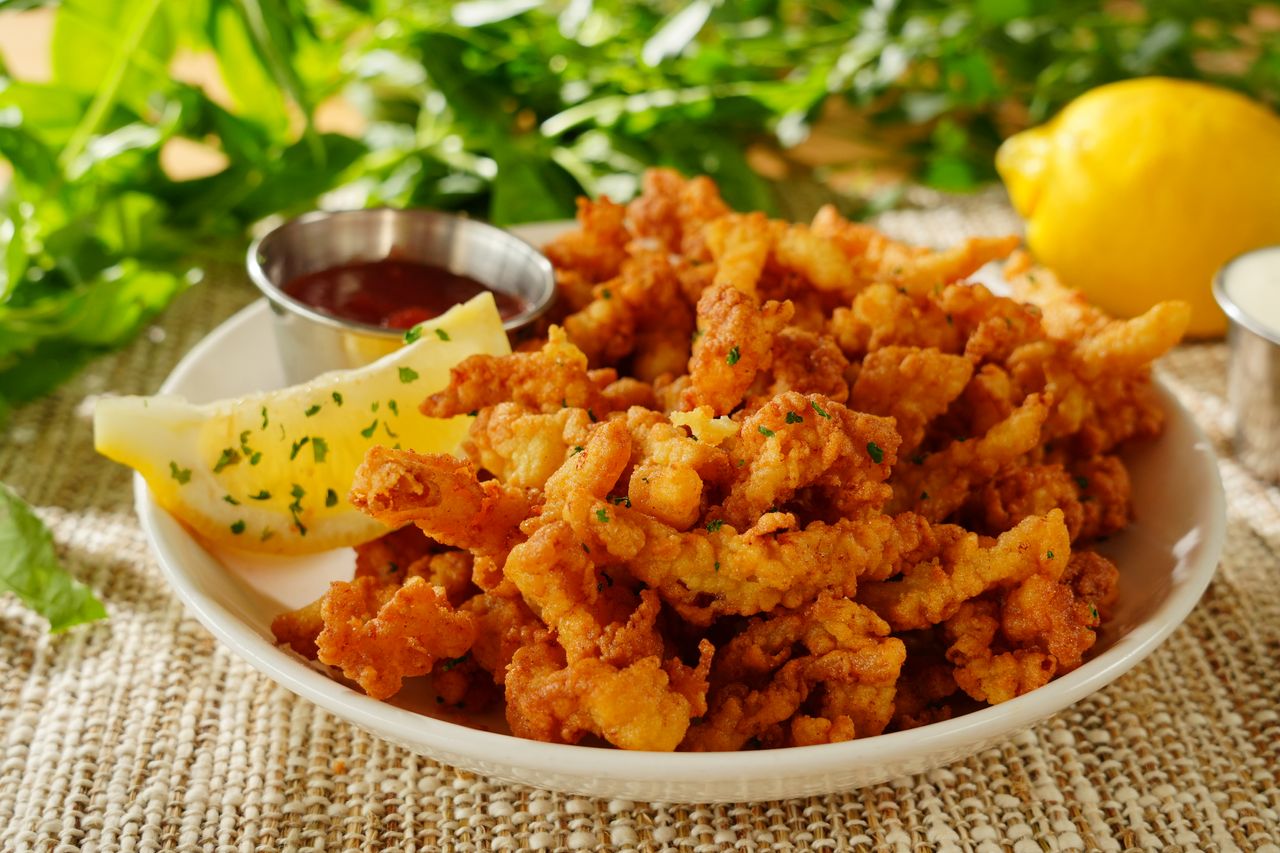 Fried Calamari with Lemon and Dipping Sauce at Hutto Seafood Wings Seafood Restaurant in Irmo, South Carolina