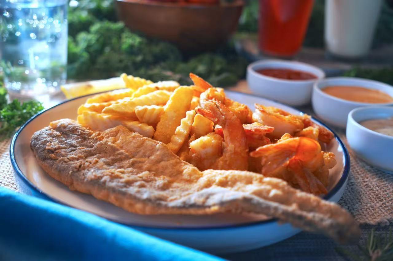 Fried Fish and Shrimp with Fries at Hutto Seafood Wings Seafood Restaurant in Irmo, South Carolina