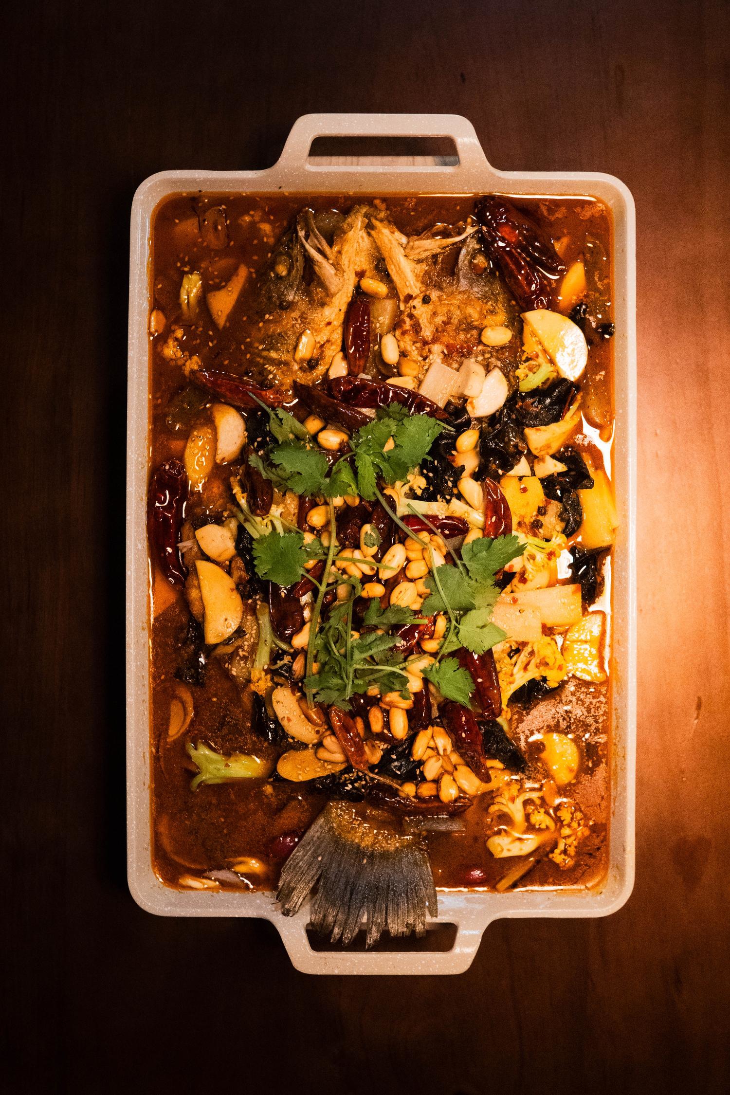Sichuan-style grilled fish in spicy broth at 梦幻冰季 - ICERA，a Asian Fusion BBQ Restaurant in New York
