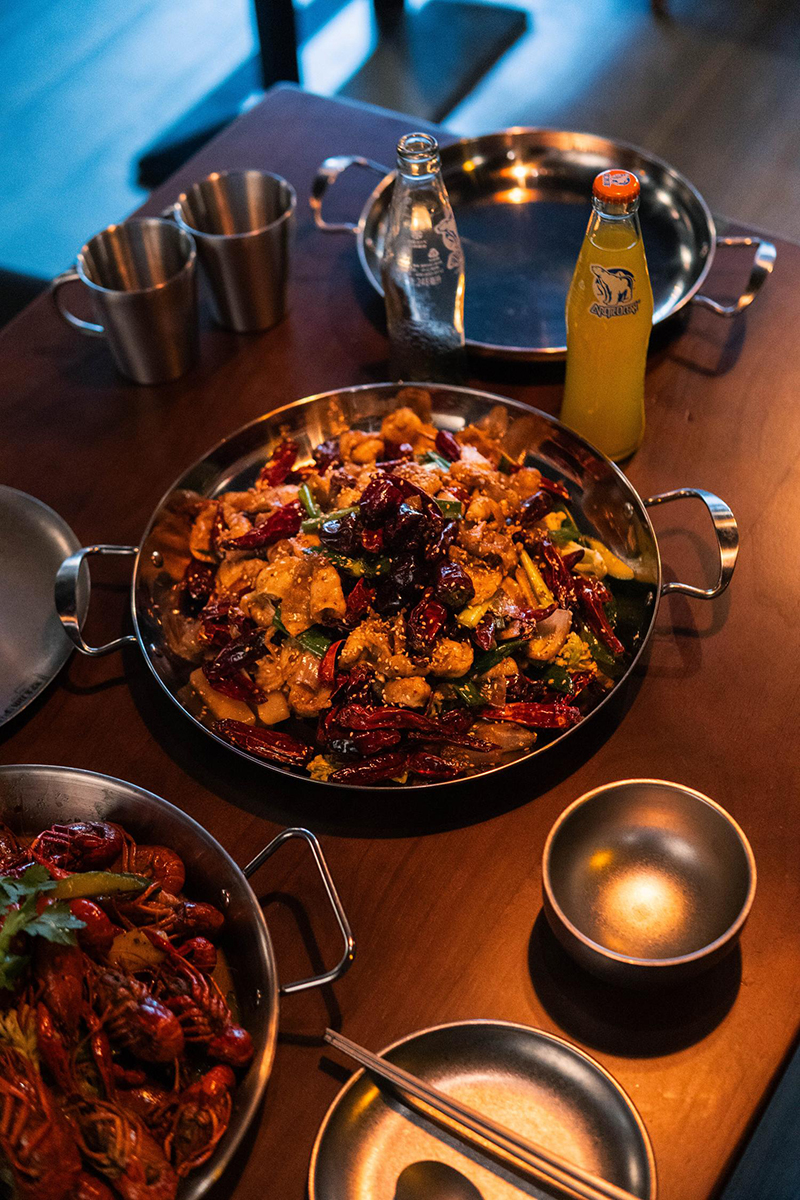 Spicy chicken and crawfish dishes at 梦幻冰季 - ICERA，a Asian Fusion BBQ Restaurant in New York