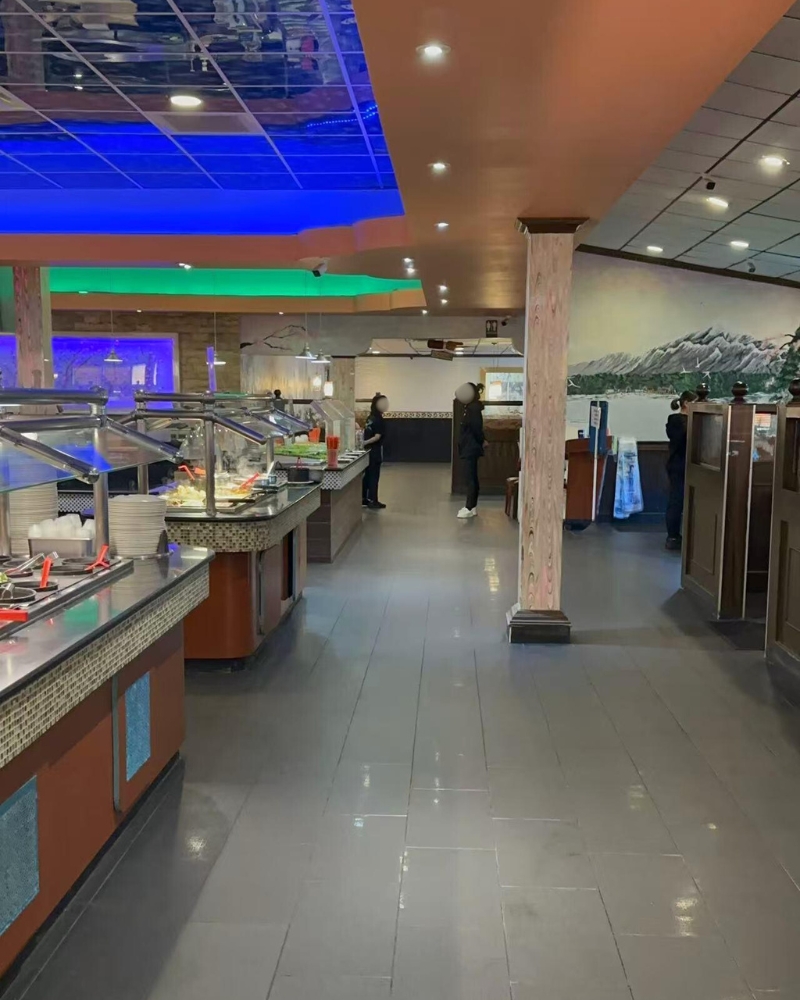 Wide corridor with buffet stations and staff at ICHIBAN BUFFET, a Buffet Restaurant in Leesburg.