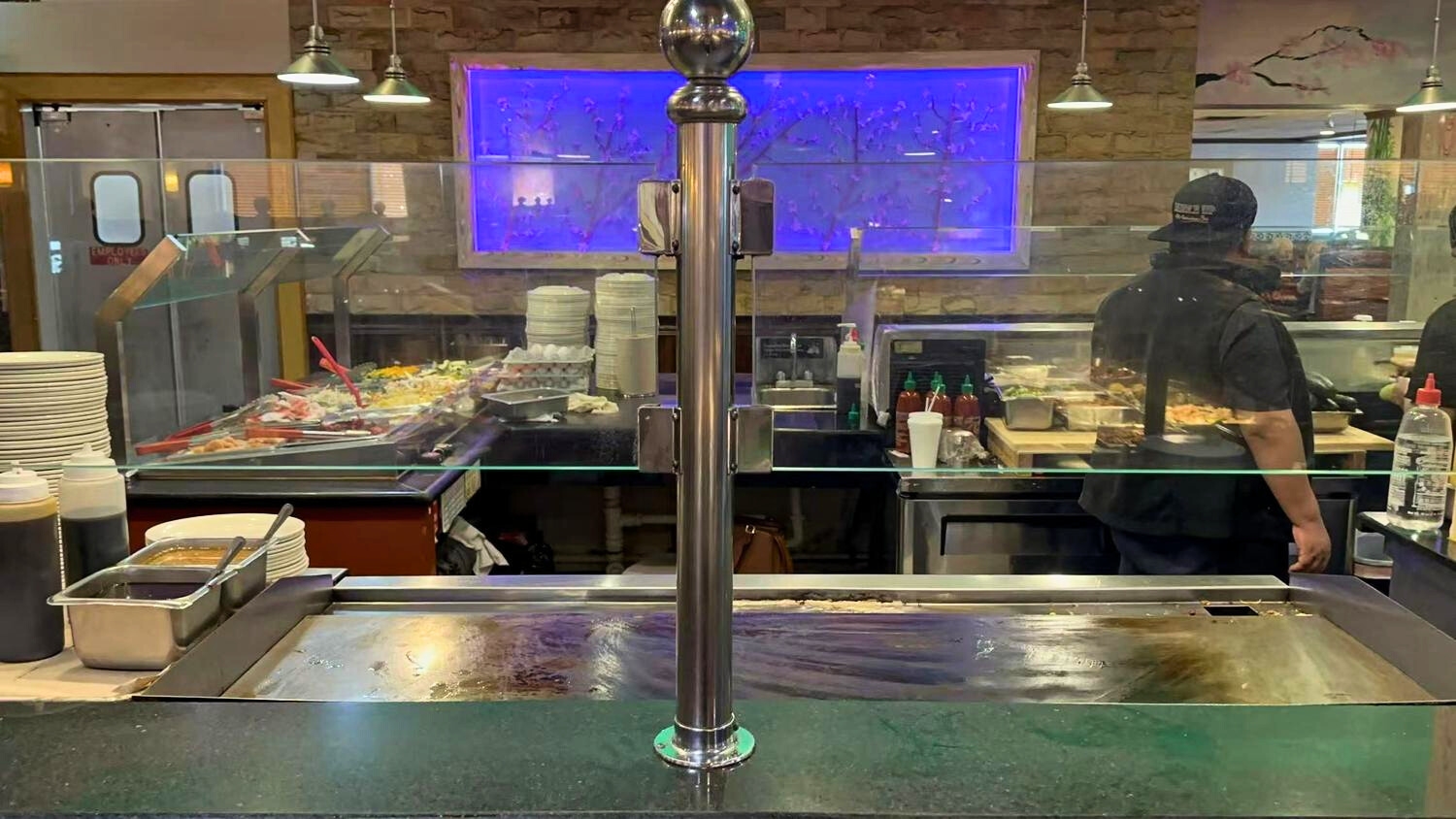 Hibachi grill station with food prep areas at ICHIBAN BUFFET, a Buffet Restaurant in Leesburg.