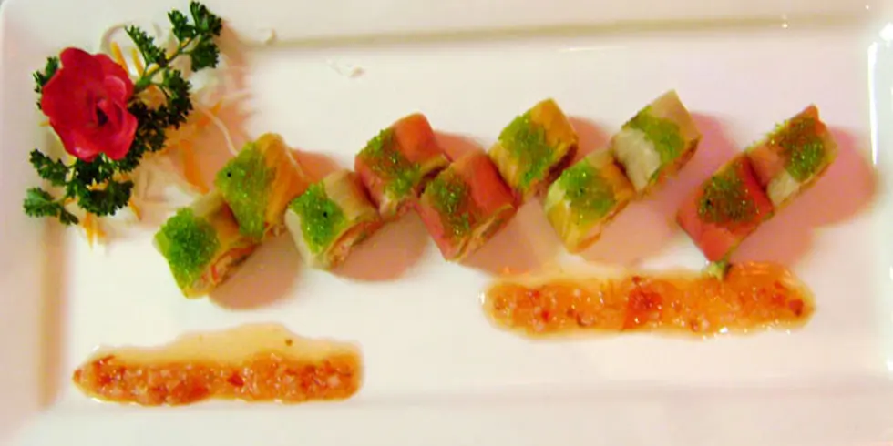 Colorful special sushi roll with green tobiko and sauces at Ichiban, a Japanese Restaurant in Sheffield