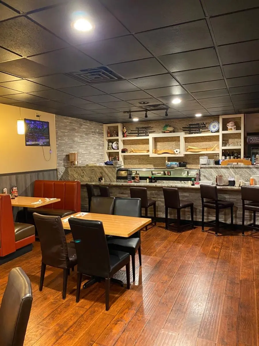 Spacious dining area with wooden floors and sushi bar at Ichiban, a Japanese Restaurant in Sheffield