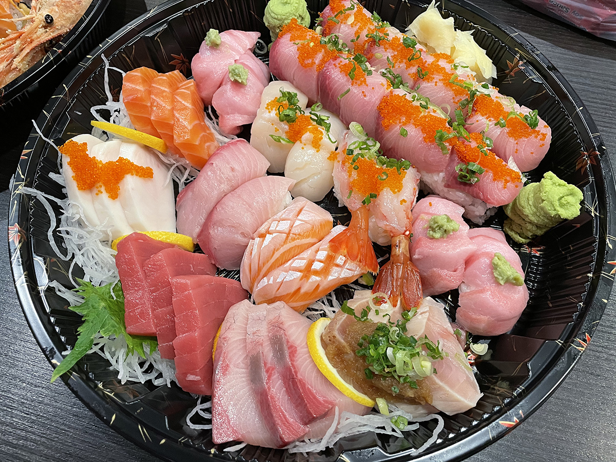 Sushi-Ichimoto-Authentic-Japanese-Restaurant-Sushi-and-Sashimi-Platter-Hayward A plate with a mix of sashimi and sushi at Sushi Ichimoto,a Authentic Japanese Restaurant in Hayward