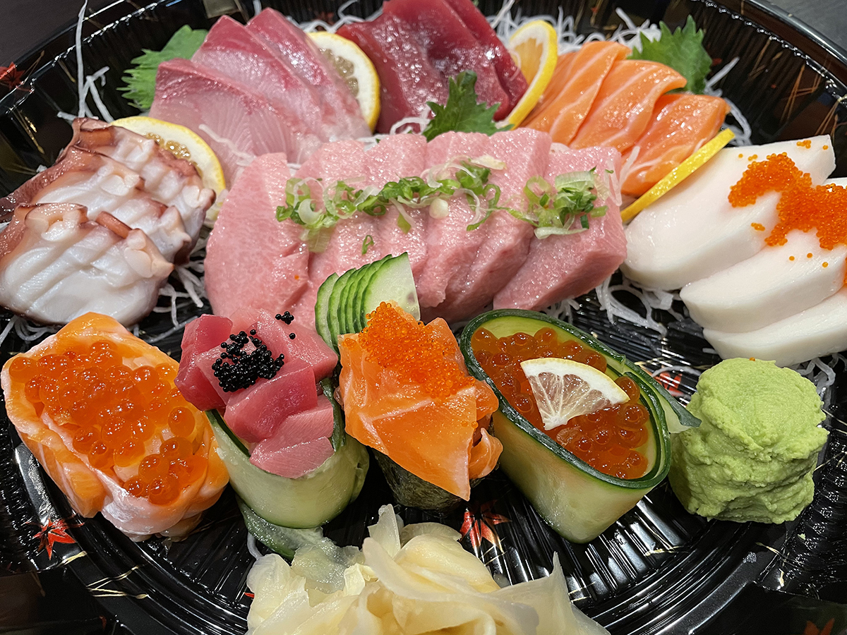 Sushi-Ichimoto-Authentic-Japanese-Restaurant-Sashimi-Platter-Hayward A platter of assorted sashimi with garnishes at Sushi Ichimoto,a Authentic Japanese Restaurant in Hayward