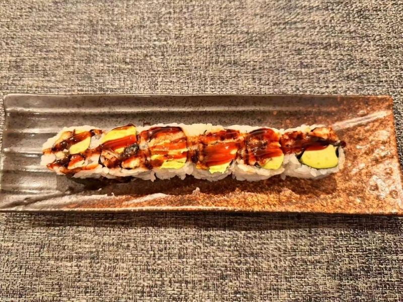 Sushi roll with eel and avocado at Ikyu Sushi II, a Japanese Restaurant in New York.