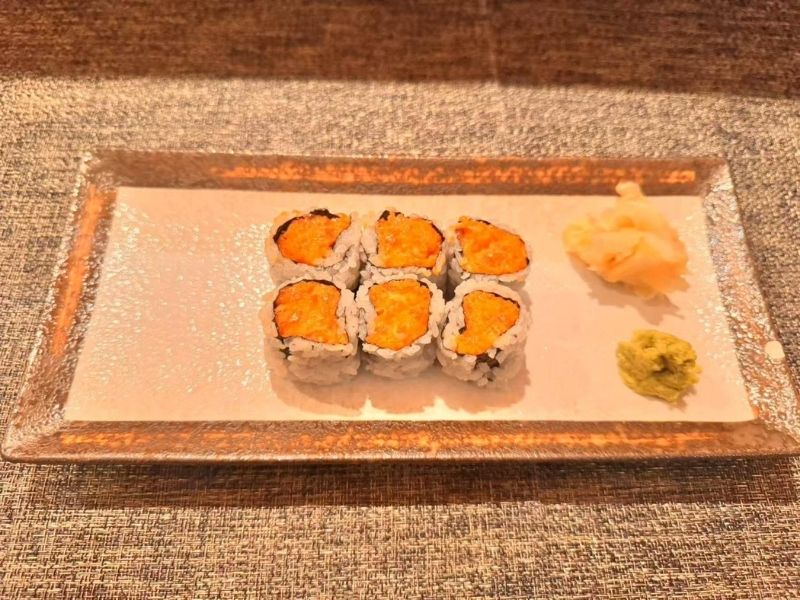 Plate of spicy salmon sushi rolls at Ikyu Sushi II, a Japanese Restaurant in New York.