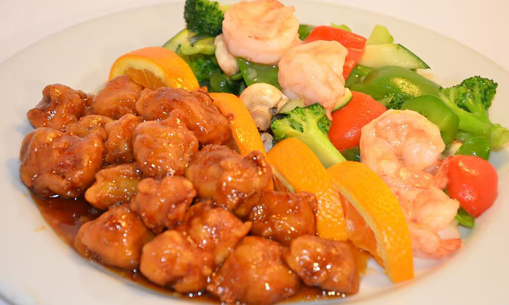 Orange chicken and shrimp with mixed veggies, a perfect combo of flavors at Imperial Dynasty, a Chinese Restaurant in Cranston
