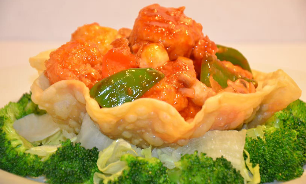Shrimp in zesty sauce served in a crispy wonton bowl, visually appealing at Imperial Dynasty, a Chinese Restaurant in Cranston