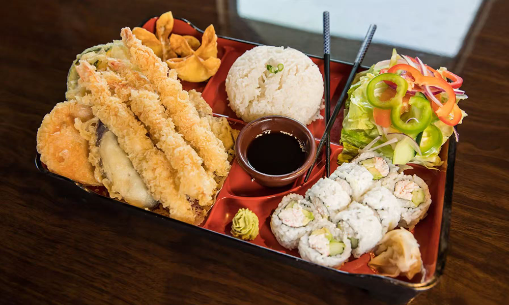 Assorted tempura, sushi, rice and salad in a bento box, a complete meal at Imperial Dynasty, a Chinese Restaurant in Cranston