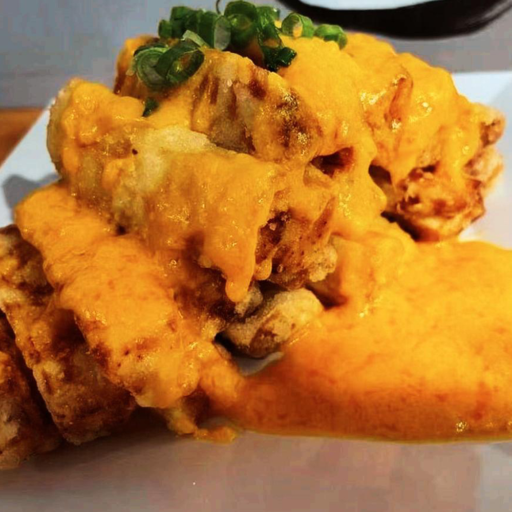 Cheese-Topped Fried Chicken from Imperial Feast Kitchen, a Chinese Restaurant in Hewlett