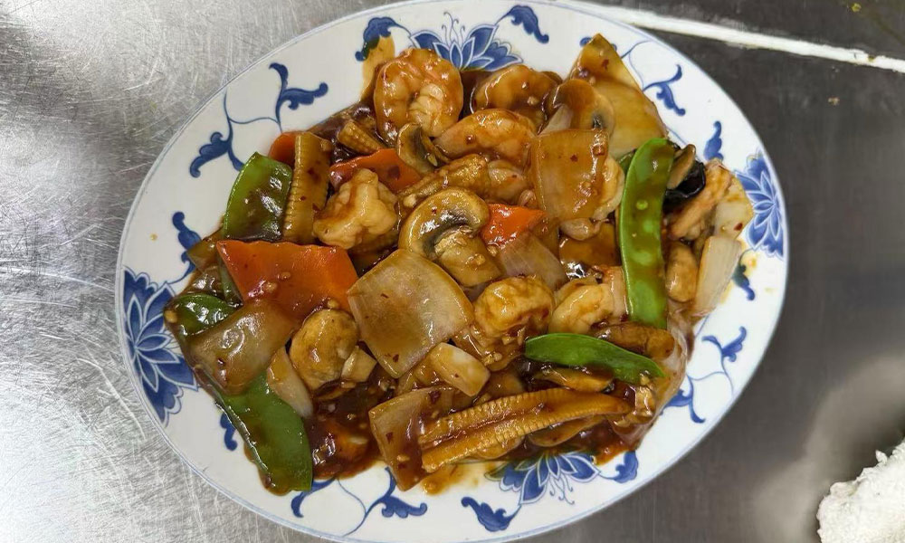 Shrimp and mixed vegetable stir-fry with snow peas, baby corn, and carrots at Imperial Garden, a Chinese Restaurant in Philadelphia