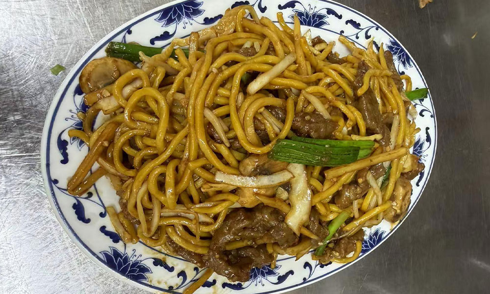 Beef lo mein stir-fried noodles with mushrooms, scallions, and bean sprouts at Imperial Garden, a Chinese Restaurant in Philadelphia