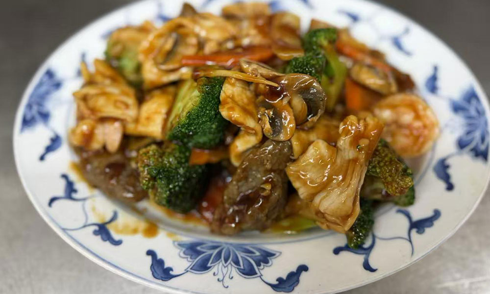 Mixed meat and vegetable stir-fry with shrimp, beef, broccoli, and mushrooms at Imperial Garden, a Chinese Restaurant in Philadelphia