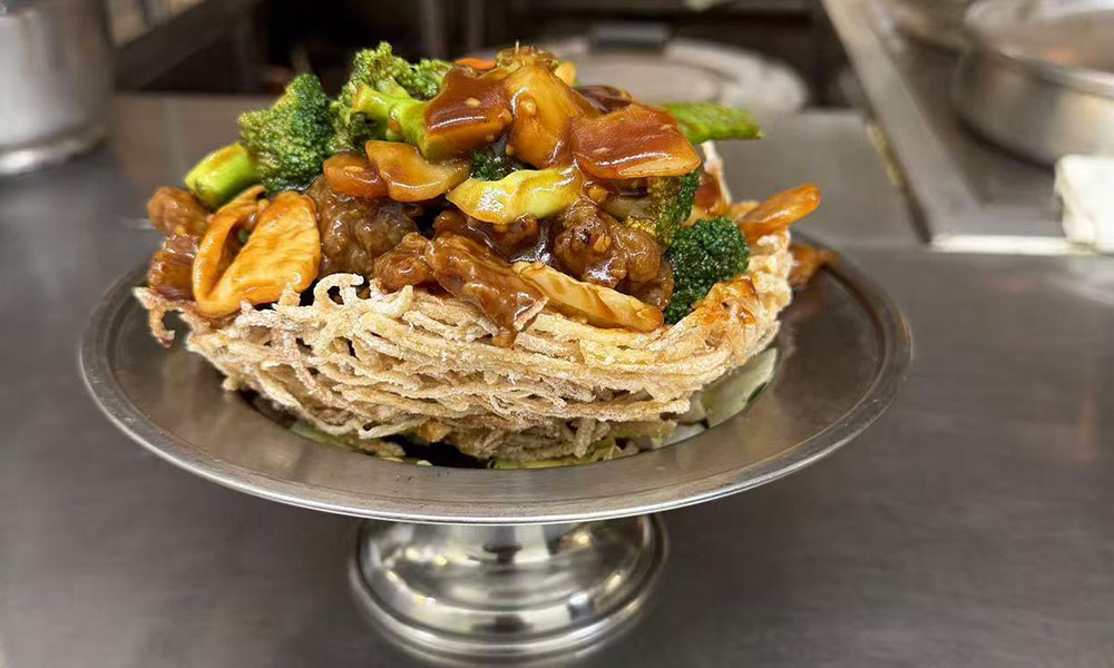 Crispy noodle basket filled with stir-fried meat and vegetables at Imperial Garden, a Chinese Restaurant in Philadelphia