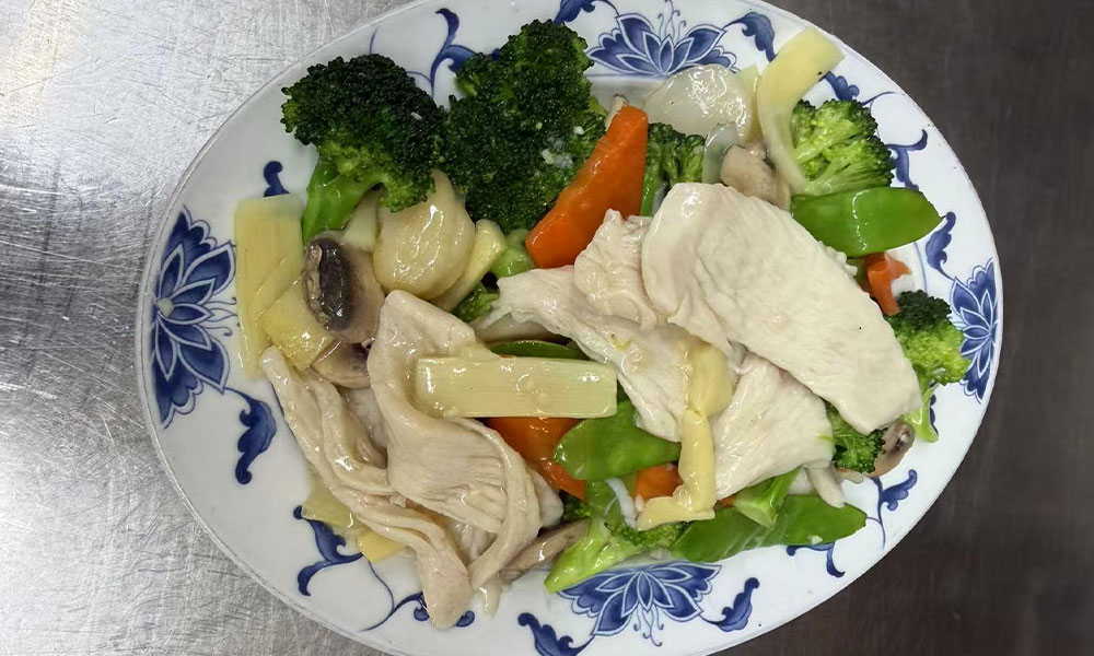 Light chicken and vegetable stir-fry with broccoli, bamboo shoots, and mushrooms at Imperial Garden, a Chinese Restaurant in Philadelphia