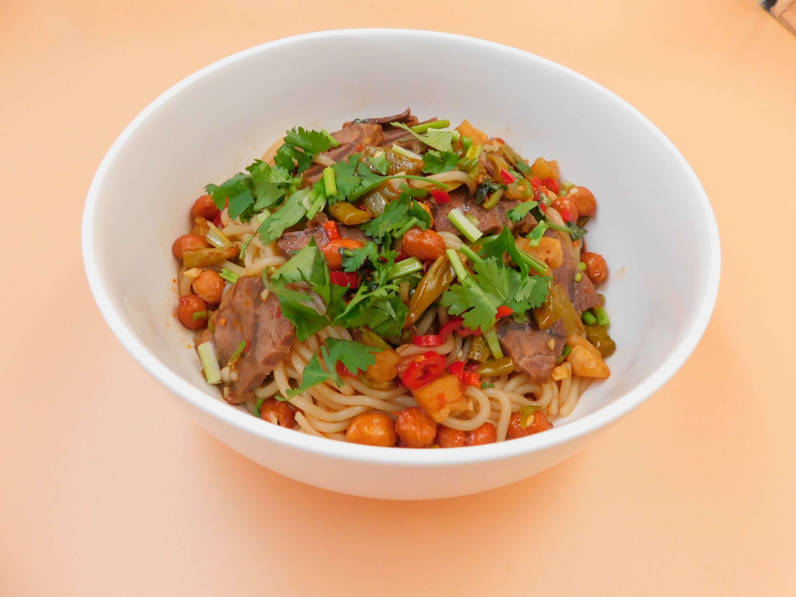 Okinii-Japanese-Restaurant&Impressive-Noodle-Asian-Fusion-Restaurant-Spicy-Beef-Dry-Noodles-Massapequa Spicy dry noodles with beef, peanuts and cilantro at Okinii Japanese Restaurant & Impressive Noodle, a Asian Fusion Restaurant in Massapequa