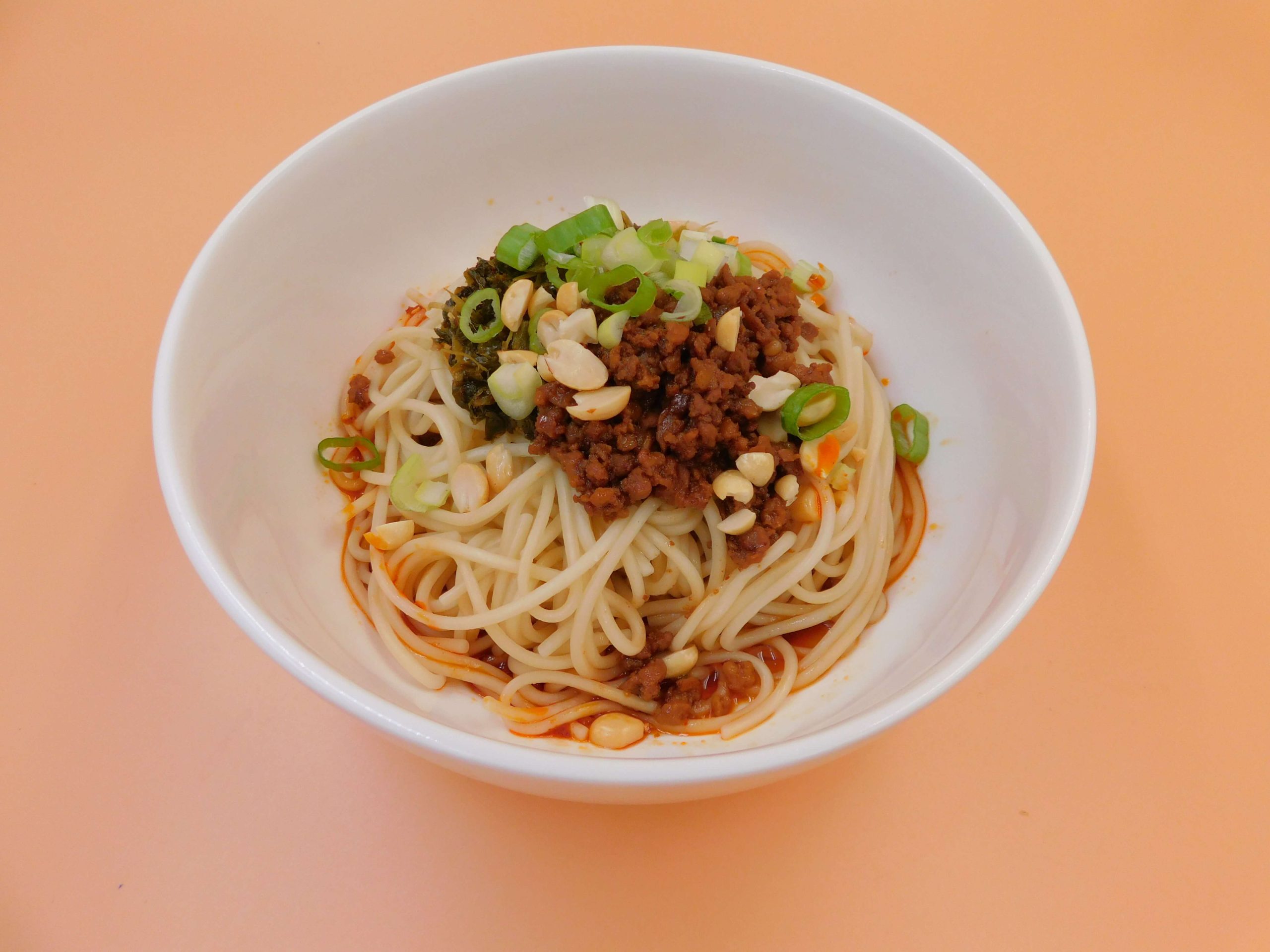 Dry noodles with meat mince, peanuts and green onions at Okinii Japanese Restaurant & Impressive Noodle, a Asian Fusion Restaurant in Massapequa
