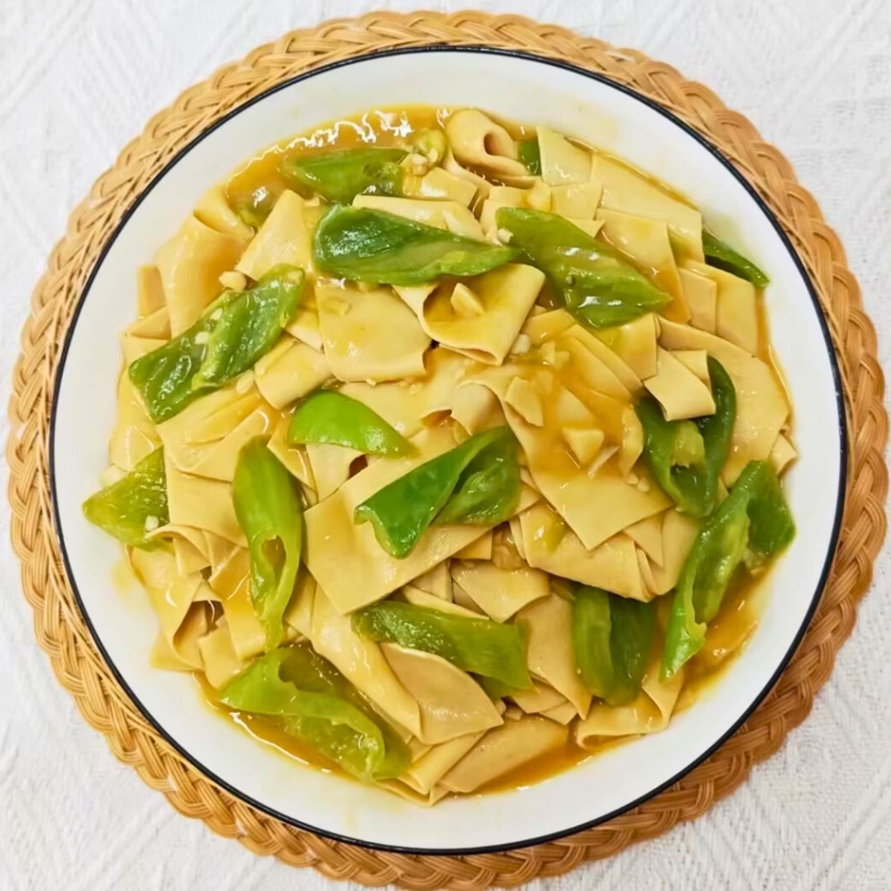 Stir-fried dried tofu sheets with green peppers in light sauce at Iron Pot Stew Kitchen, a Chinese Restaurant in Santa Clara
